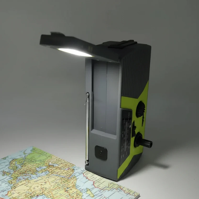 Wind Up Radio, Solar, Flashlight, Reading Lamp, USB Power - 5 in 1